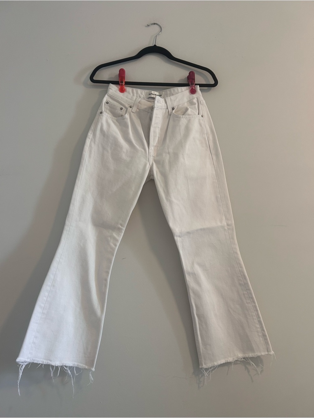Reformation White High-Rise Flare Jeans with Raw Hem
